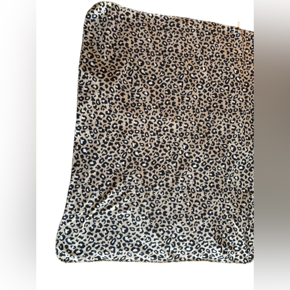 Leopard print throw 50. By 60